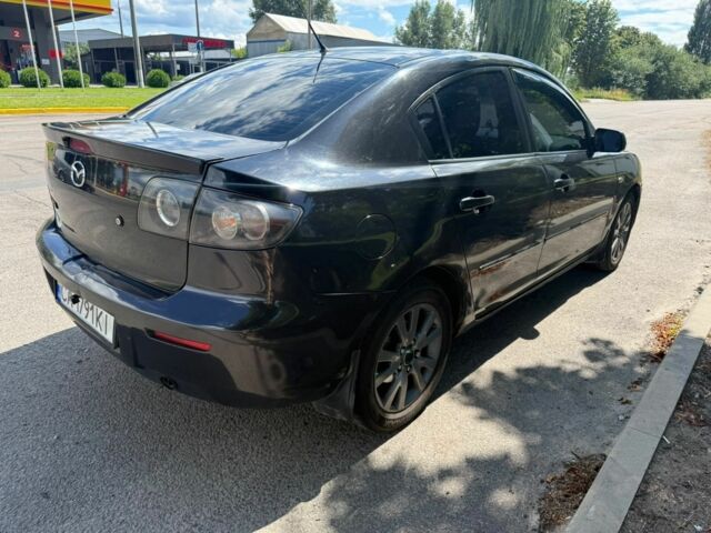 Чорний Мазда 3, об'ємом двигуна 1.6 л та пробігом 315 тис. км за 3850 $, фото 1 на Automoto.ua