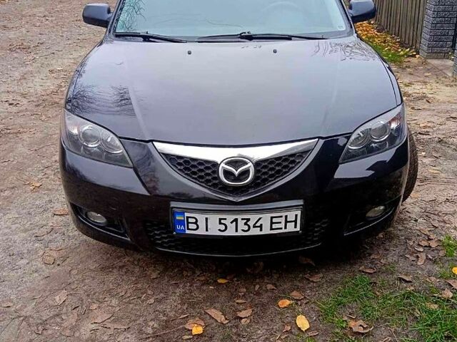 Черный Мазда 3, объемом двигателя 2 л и пробегом 240 тыс. км за 5600 $, фото 1 на Automoto.ua