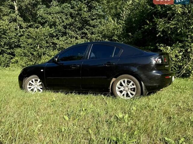 Чорний Мазда 3, об'ємом двигуна 1.6 л та пробігом 186 тис. км за 6799 $, фото 1 на Automoto.ua