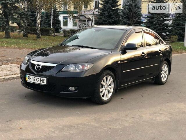 Чорний Мазда 3, об'ємом двигуна 1.6 л та пробігом 113 тис. км за 7600 $, фото 1 на Automoto.ua