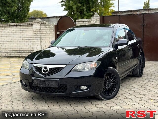 Чорний Мазда 3, об'ємом двигуна 1.6 л та пробігом 201 тис. км за 5900 $, фото 1 на Automoto.ua