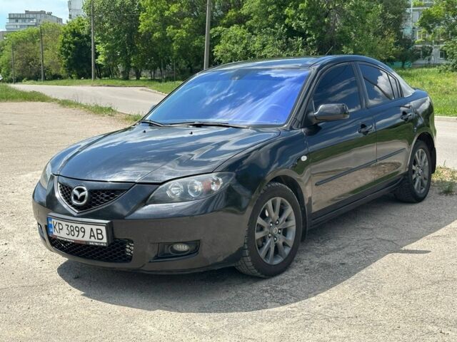 Черный Мазда 3, объемом двигателя 1.6 л и пробегом 300 тыс. км за 5200 $, фото 1 на Automoto.ua