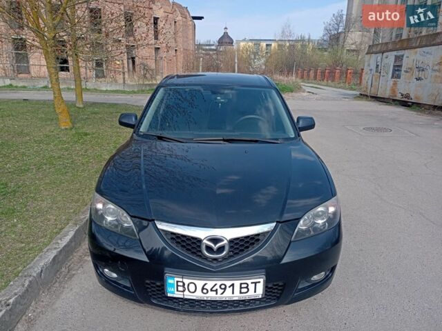 Черный Мазда 3, объемом двигателя 1.6 л и пробегом 217 тыс. км за 5500 $, фото 1 на Automoto.ua