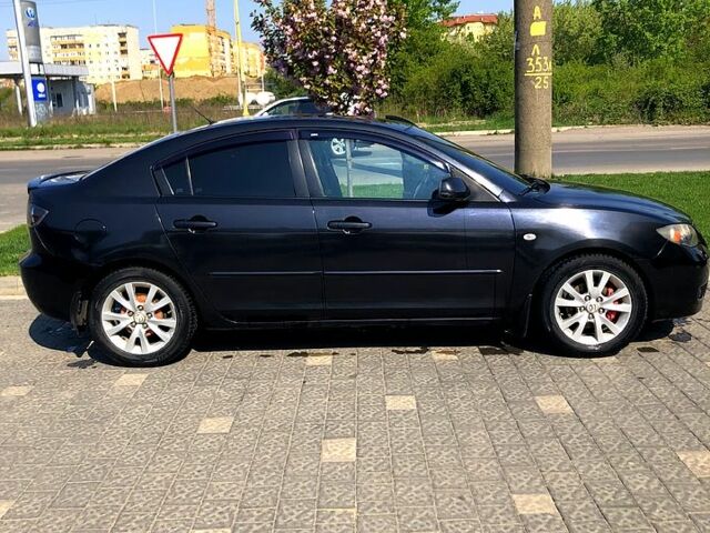 Чорний Мазда 3, об'ємом двигуна 1.6 л та пробігом 195 тис. км за 6150 $, фото 1 на Automoto.ua