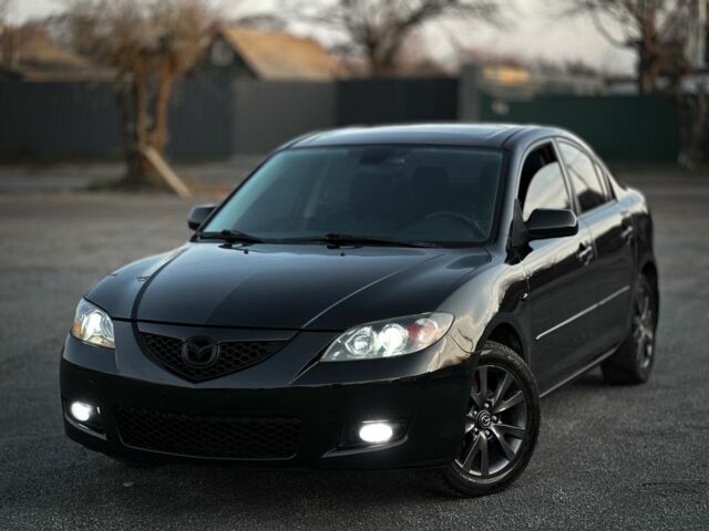 Черный Мазда 3, объемом двигателя 1.6 л и пробегом 290 тыс. км за 4400 $, фото 1 на Automoto.ua