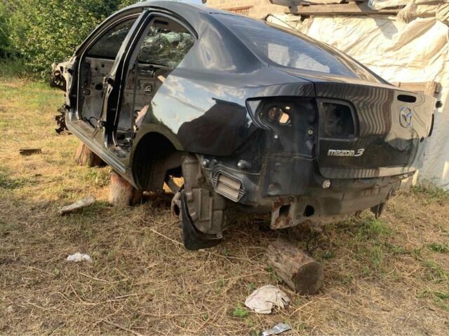 Чорний Мазда 3, об'ємом двигуна 1.6 л та пробігом 210 тис. км за 589 $, фото 1 на Automoto.ua