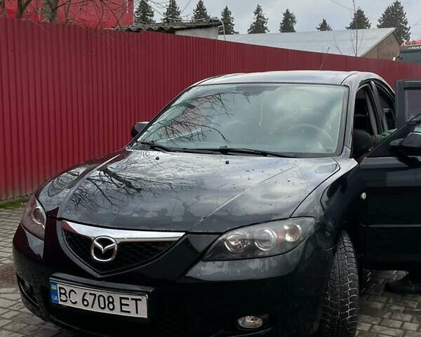 Черный Мазда 3, объемом двигателя 1.6 л и пробегом 189 тыс. км за 4500 $, фото 1 на Automoto.ua