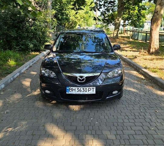 Черный Мазда 3, объемом двигателя 1.6 л и пробегом 207 тыс. км за 6200 $, фото 1 на Automoto.ua