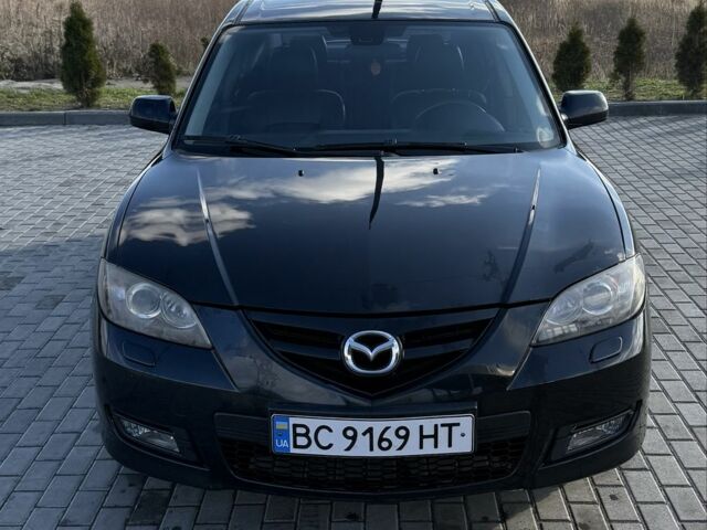Черный Мазда 3, объемом двигателя 2 л и пробегом 154 тыс. км за 5500 $, фото 1 на Automoto.ua