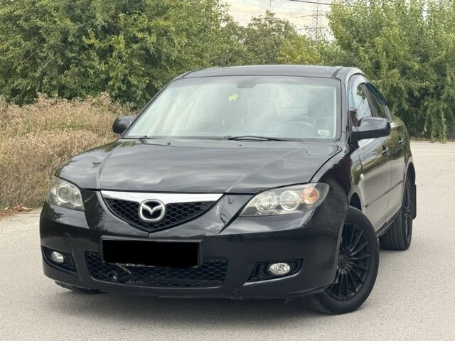 Черный Мазда 3, объемом двигателя 1.6 л и пробегом 200 тыс. км за 5900 $, фото 1 на Automoto.ua