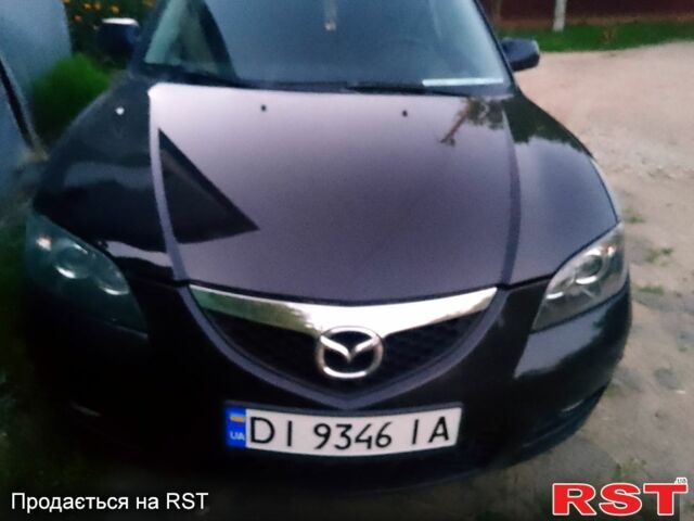 Черный Мазда 3, объемом двигателя 1.6 л и пробегом 240 тыс. км за 5500 $, фото 1 на Automoto.ua