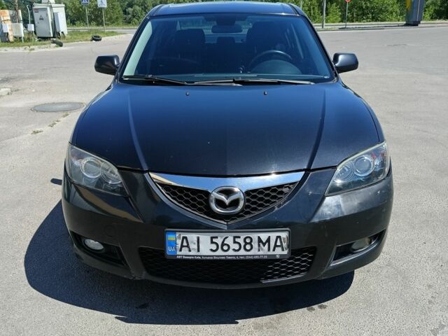 Чорний Мазда 3, об'ємом двигуна 1.6 л та пробігом 290 тис. км за 4515 $, фото 1 на Automoto.ua