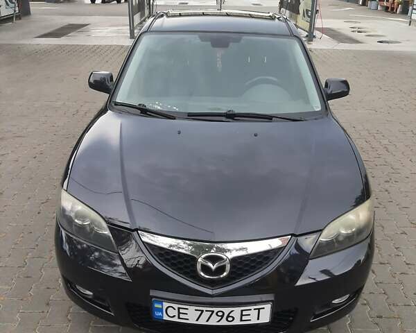 Черный Мазда 3, объемом двигателя 1.6 л и пробегом 183 тыс. км за 5800 $, фото 1 на Automoto.ua