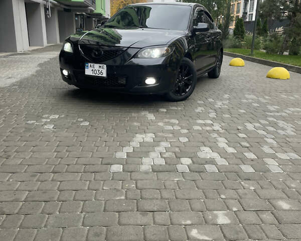 Черный Мазда 3, объемом двигателя 1.6 л и пробегом 206 тыс. км за 6000 $, фото 1 на Automoto.ua