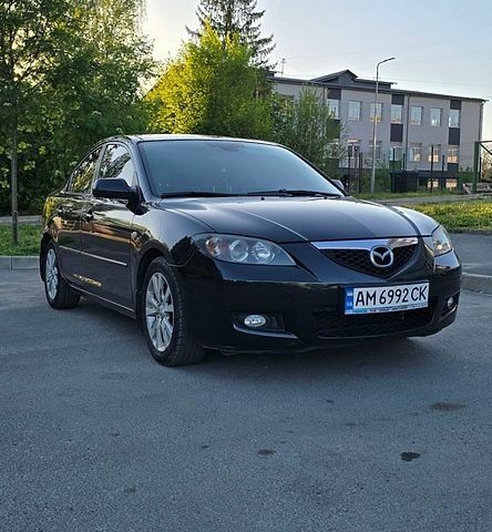 Черный Мазда 3, объемом двигателя 1.6 л и пробегом 142 тыс. км за 6000 $, фото 1 на Automoto.ua