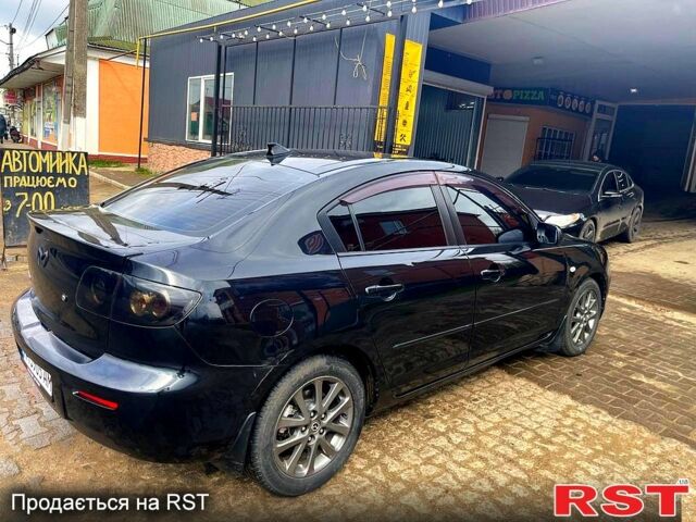Чорний Мазда 3, об'ємом двигуна 2 л та пробігом 230 тис. км за 6100 $, фото 1 на Automoto.ua
