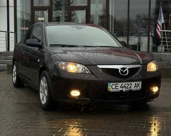 Черный Мазда 3, объемом двигателя 1.6 л и пробегом 89 тыс. км за 4800 $, фото 1 на Automoto.ua