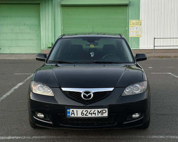 Черный Мазда 3, объемом двигателя 1.6 л и пробегом 225 тыс. км за 5900 $, фото 1 на Automoto.ua