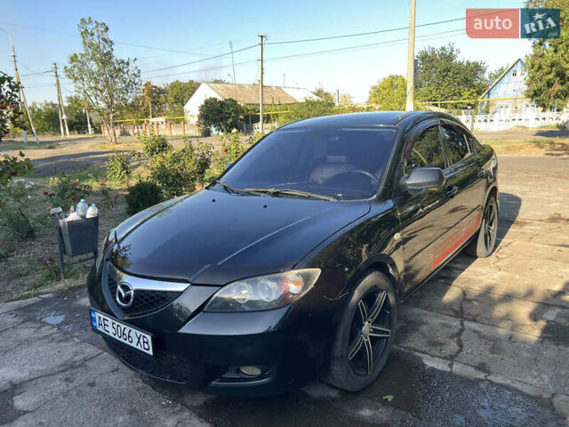 Черный Мазда 3, объемом двигателя 2 л и пробегом 224 тыс. км за 6400 $, фото 1 на Automoto.ua