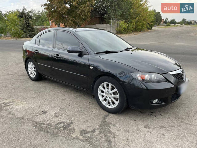 Чорний Мазда 3, об'ємом двигуна 1.6 л та пробігом 183 тис. км за 6800 $, фото 1 на Automoto.ua