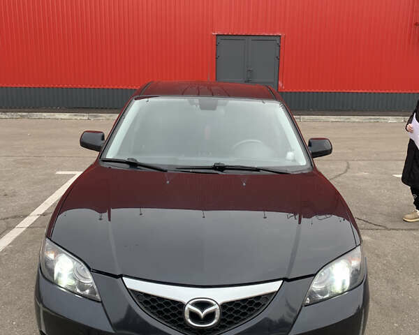 Чорний Мазда 3, об'ємом двигуна 1.6 л та пробігом 318 тис. км за 5200 $, фото 1 на Automoto.ua