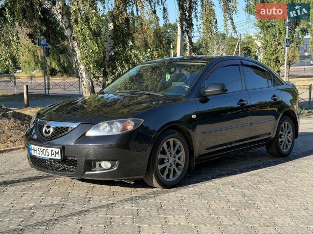 Черный Мазда 3, объемом двигателя 2 л и пробегом 218 тыс. км за 4700 $, фото 1 на Automoto.ua