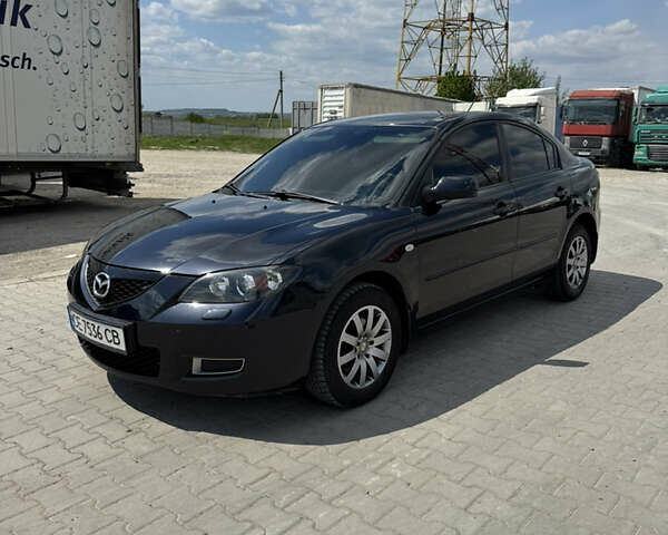 Черный Мазда 3, объемом двигателя 1.6 л и пробегом 268 тыс. км за 5100 $, фото 1 на Automoto.ua