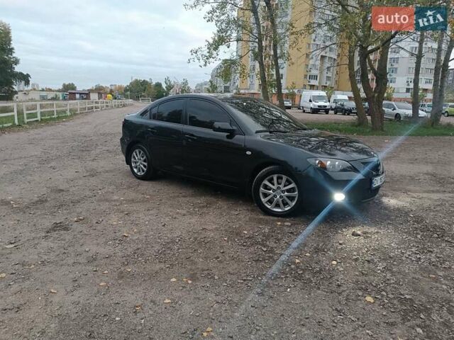 Черный Мазда 3, объемом двигателя 2 л и пробегом 221 тыс. км за 5700 $, фото 1 на Automoto.ua