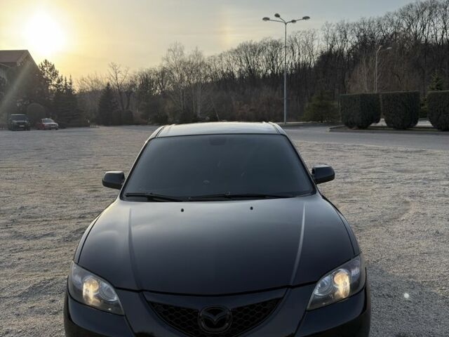 Черный Мазда 3, объемом двигателя 1.6 л и пробегом 189 тыс. км за 6000 $, фото 1 на Automoto.ua