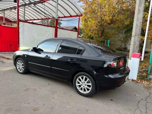 Черный Мазда 3, объемом двигателя 1.6 л и пробегом 185 тыс. км за 7750 $, фото 1 на Automoto.ua