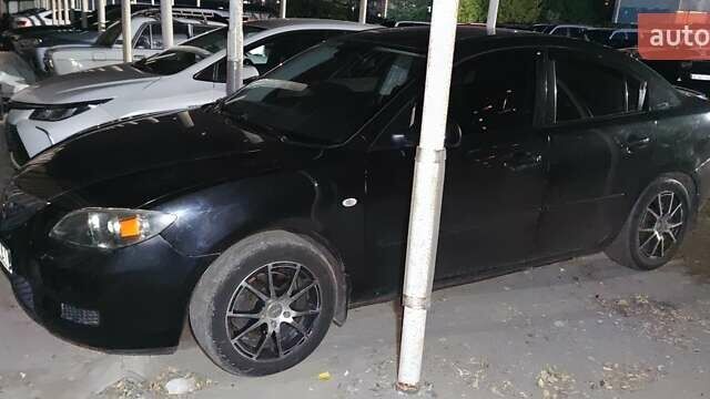 Черный Мазда 3, объемом двигателя 1.6 л и пробегом 222 тыс. км за 5450 $, фото 1 на Automoto.ua