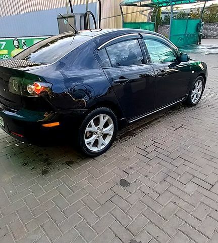 Черный Мазда 3, объемом двигателя 2 л и пробегом 224 тыс. км за 5500 $, фото 1 на Automoto.ua