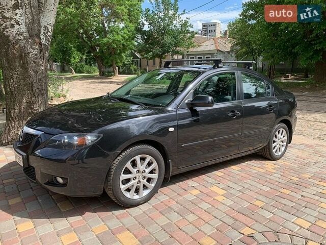 Черный Мазда 3, объемом двигателя 2 л и пробегом 241 тыс. км за 5999 $, фото 1 на Automoto.ua