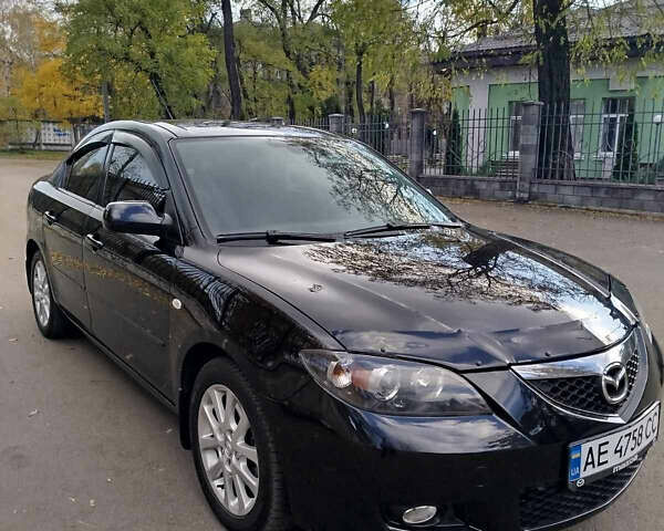 Черный Мазда 3, объемом двигателя 2 л и пробегом 199 тыс. км за 6800 $, фото 1 на Automoto.ua