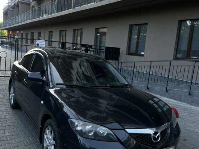 Черный Мазда 3, объемом двигателя 1.6 л и пробегом 320 тыс. км за 5000 $, фото 1 на Automoto.ua