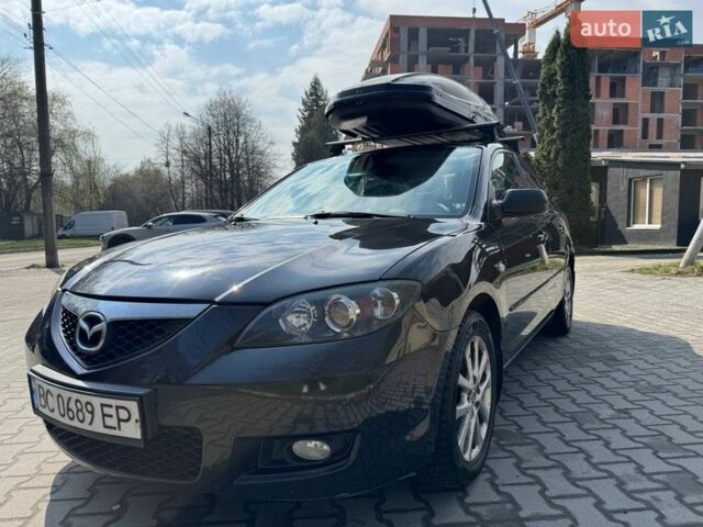 Черный Мазда 3, объемом двигателя 2 л и пробегом 240 тыс. км за 5950 $, фото 1 на Automoto.ua