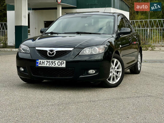 Черный Мазда 3, объемом двигателя 1.6 л и пробегом 158 тыс. км за 6200 $, фото 1 на Automoto.ua