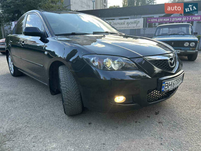Черный Мазда 3, объемом двигателя 1.6 л и пробегом 153 тыс. км за 5500 $, фото 1 на Automoto.ua