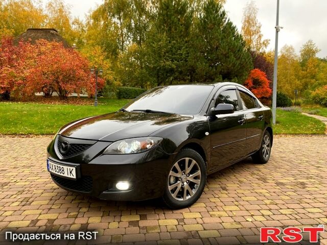 Черный Мазда 3, объемом двигателя 1.6 л и пробегом 218 тыс. км за 6000 $, фото 1 на Automoto.ua