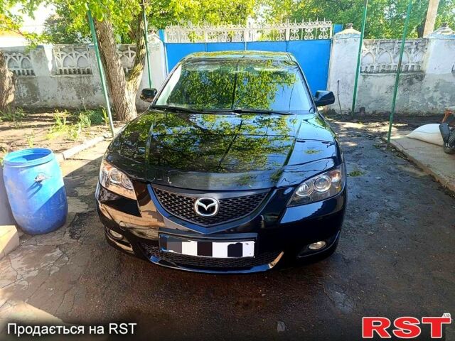 Черный Мазда 3, объемом двигателя 1.6 л и пробегом 230 тыс. км за 4100 $, фото 1 на Automoto.ua