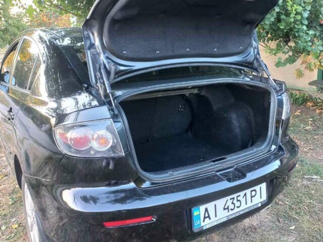Черный Мазда 3, объемом двигателя 2 л и пробегом 247 тыс. км за 5800 $, фото 1 на Automoto.ua
