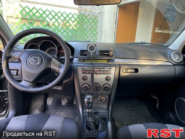 Чорний Мазда 3, об'ємом двигуна 20 л та пробігом 246 тис. км за 5500 $, фото 1 на Automoto.ua