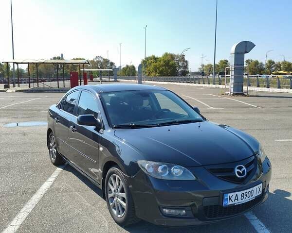 Черный Мазда 3, объемом двигателя 1.6 л и пробегом 228 тыс. км за 5800 $, фото 1 на Automoto.ua