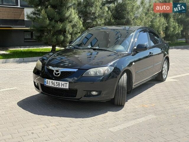 Черный Мазда 3, объемом двигателя 1.6 л и пробегом 207 тыс. км за 5800 $, фото 1 на Automoto.ua