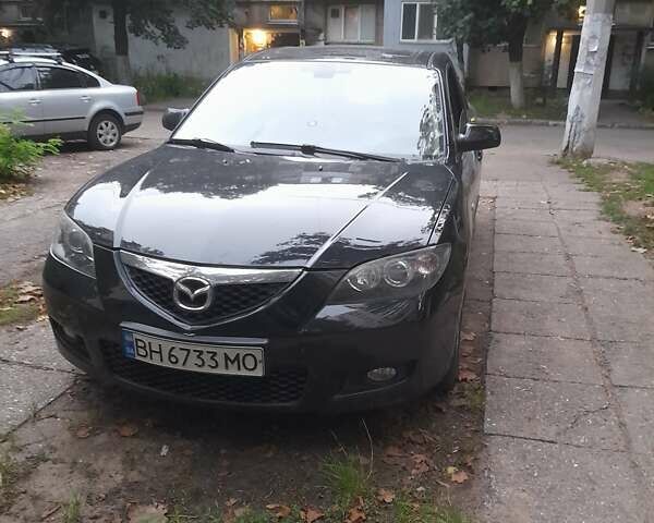 Черный Мазда 3, объемом двигателя 1.6 л и пробегом 153 тыс. км за 5500 $, фото 1 на Automoto.ua