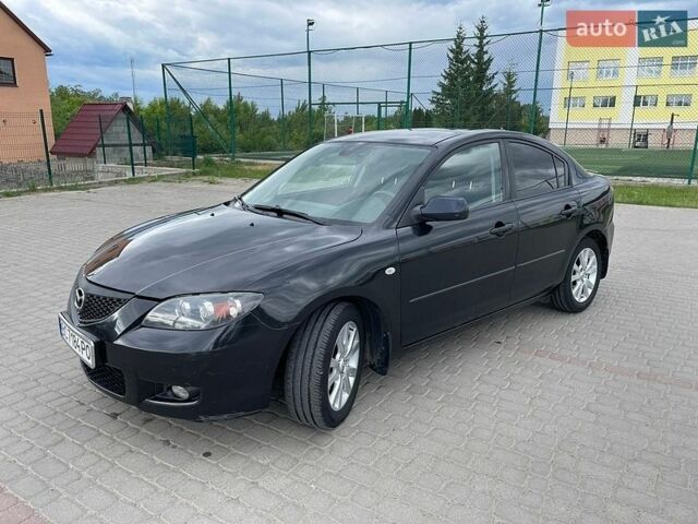 Черный Мазда 3, объемом двигателя 1.6 л и пробегом 258 тыс. км за 3700 $, фото 1 на Automoto.ua