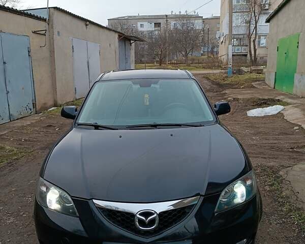 Черный Мазда 3, объемом двигателя 2 л и пробегом 176 тыс. км за 6000 $, фото 1 на Automoto.ua