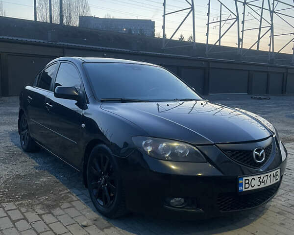 Черный Мазда 3, объемом двигателя 1.6 л и пробегом 231 тыс. км за 5800 $, фото 1 на Automoto.ua