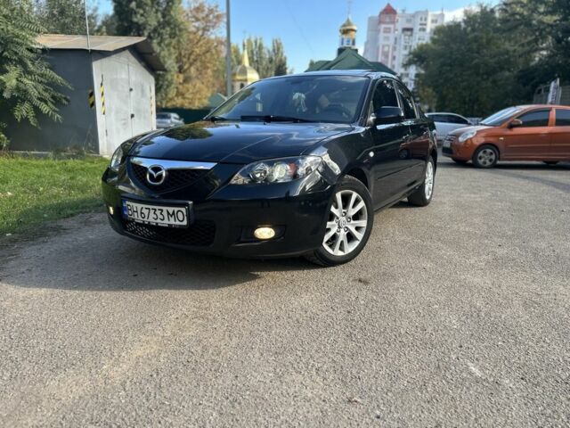 Черный Мазда 3, объемом двигателя 1.6 л и пробегом 153 тыс. км за 5700 $, фото 1 на Automoto.ua