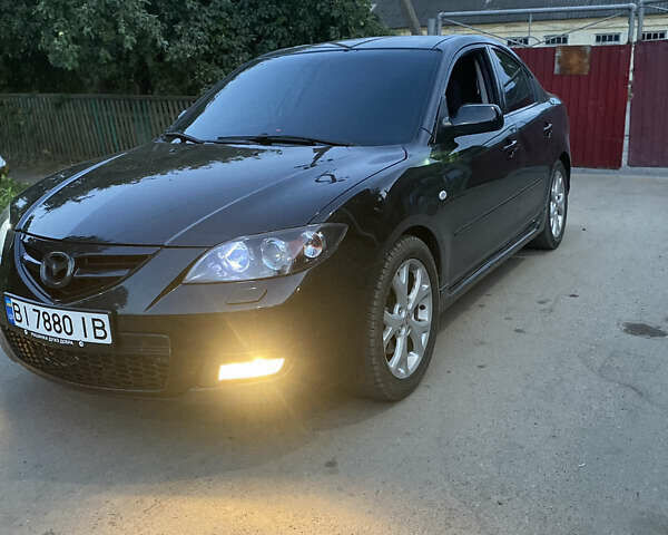 Черный Мазда 3, объемом двигателя 2 л и пробегом 204 тыс. км за 6700 $, фото 1 на Automoto.ua